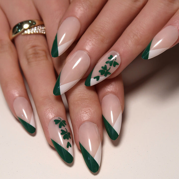 Artistic stiletto nails with cloverleaf design Bowlift