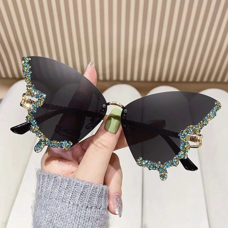 Women's extravagant sunglasses with sparkling butterfly design Bowlift