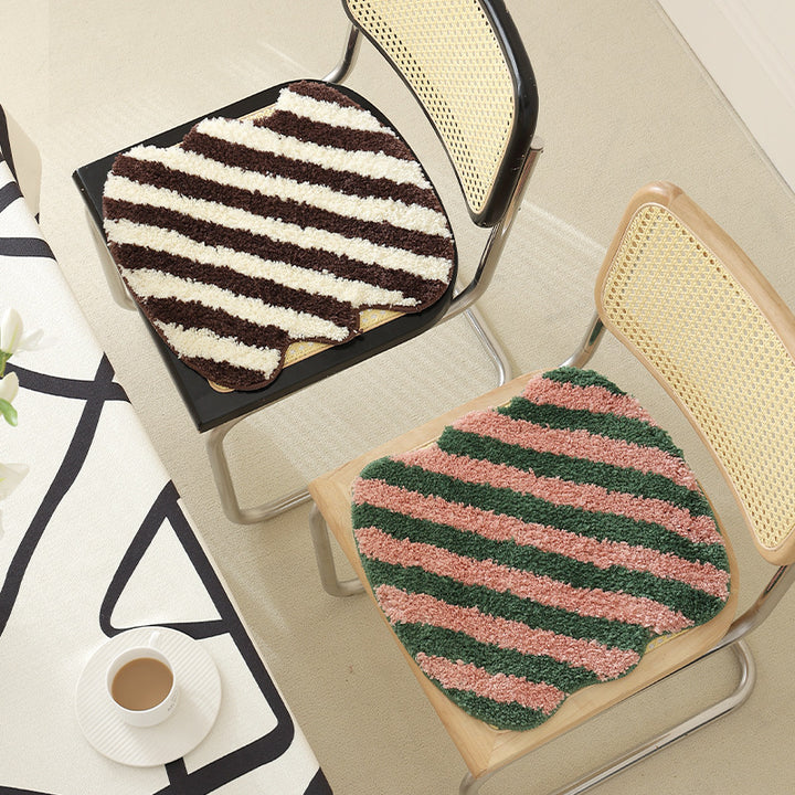 Shaped high pile bath mat with diagonal stripe structure