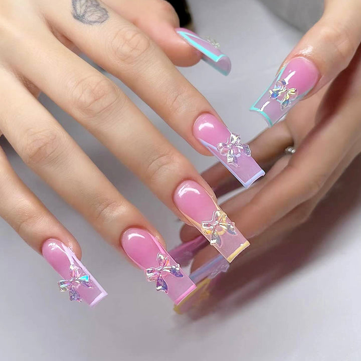 Creative and artistic nail art with butterfly accents Bowlift