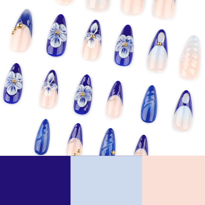 Artistic nail art with floral accents and glitter embellishments Bowlift