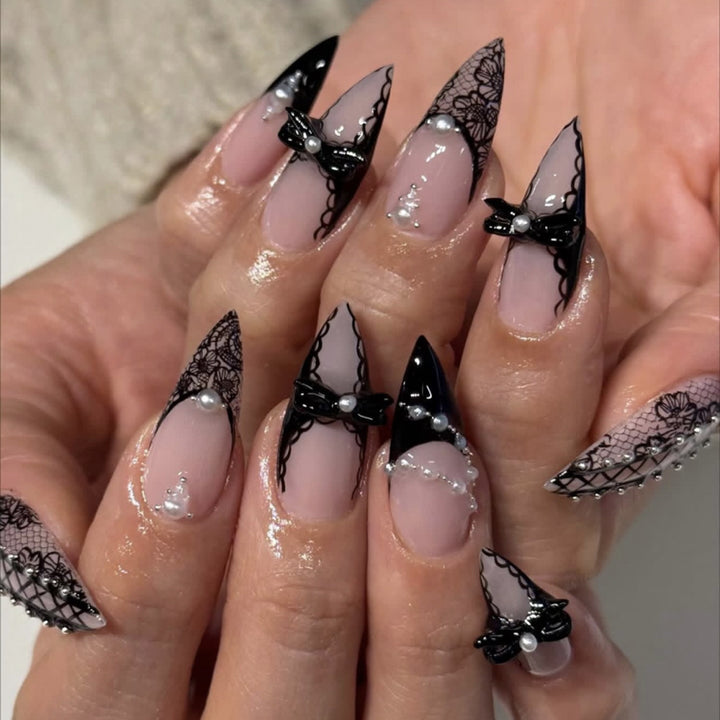 Artful stiletto nails with glitter accents Bowlift