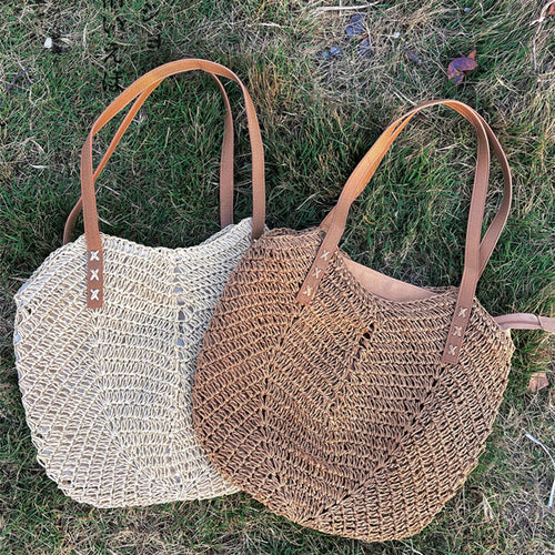 Casual bag made of handwoven straw with wide leather handles Bowlift