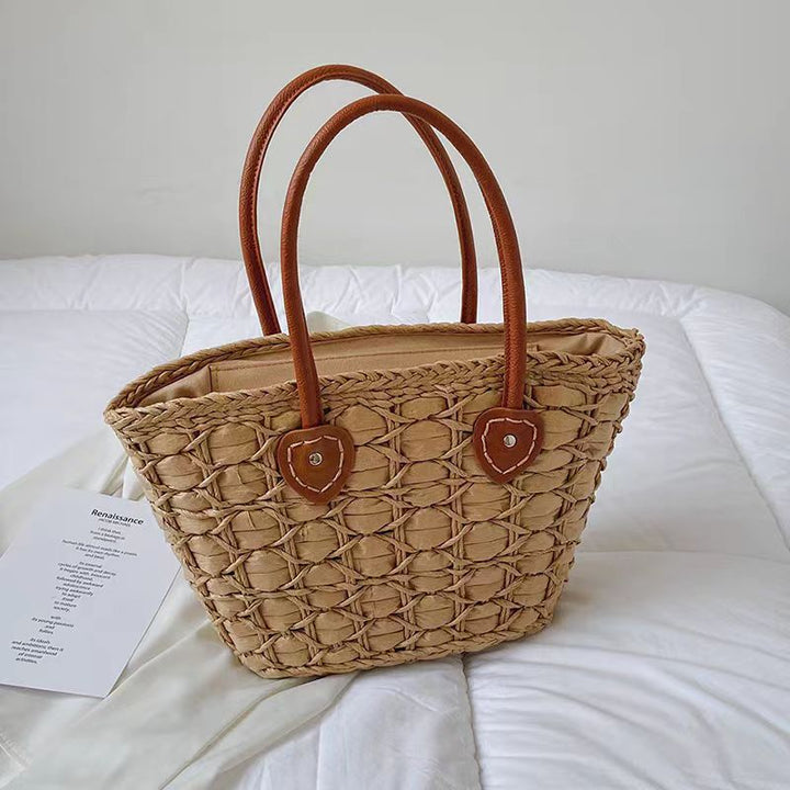 Handcrafted basket bag with elegant leather accents Bowlift