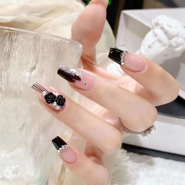 Artificial nail set with glamorous 3D rose details and elegant glitter accents Bowlift