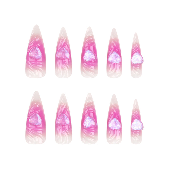 Artistic stiletto nails with heart design and glitter accents Bowlift