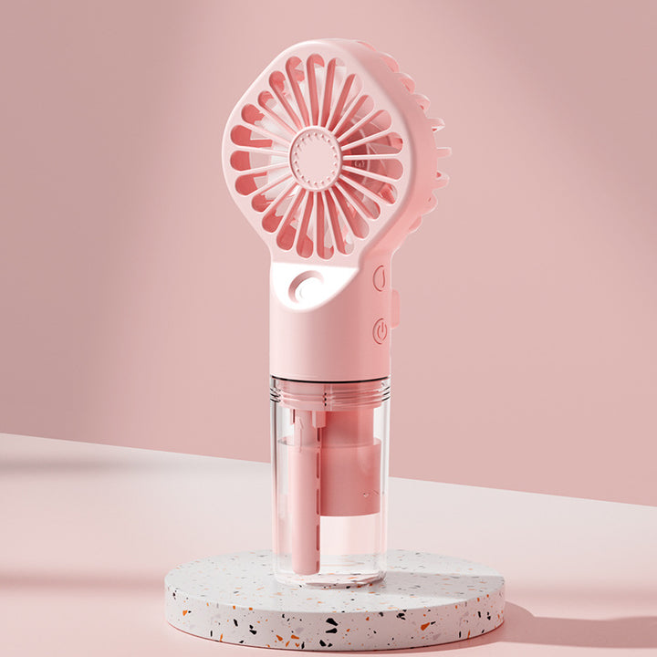 Ladies hand fan with integrated water mister Bowlift