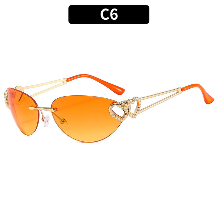 Fashion-Forward Cat-Eye Sunglasses with Heart Accents