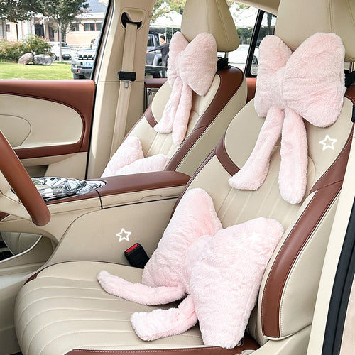 plush bow-shaped decorative throw cushion with long tails and faux-fur texture Bowlift