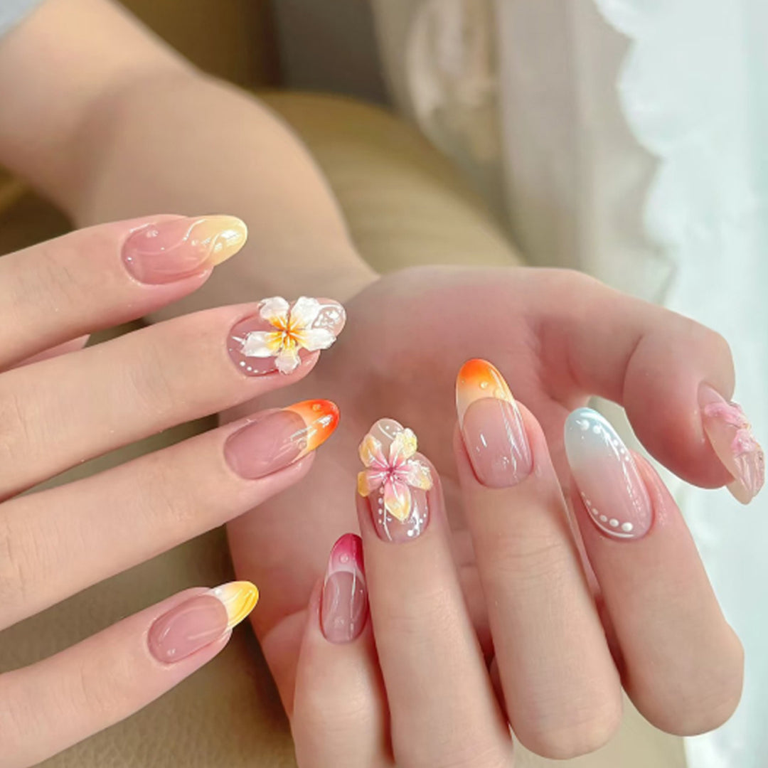 Artistic nail designs with floral accents and soft color gradients Bowlift