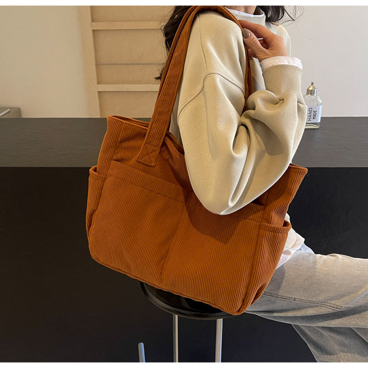 Multifunctional shoulder bag with large outer pockets Bowlift