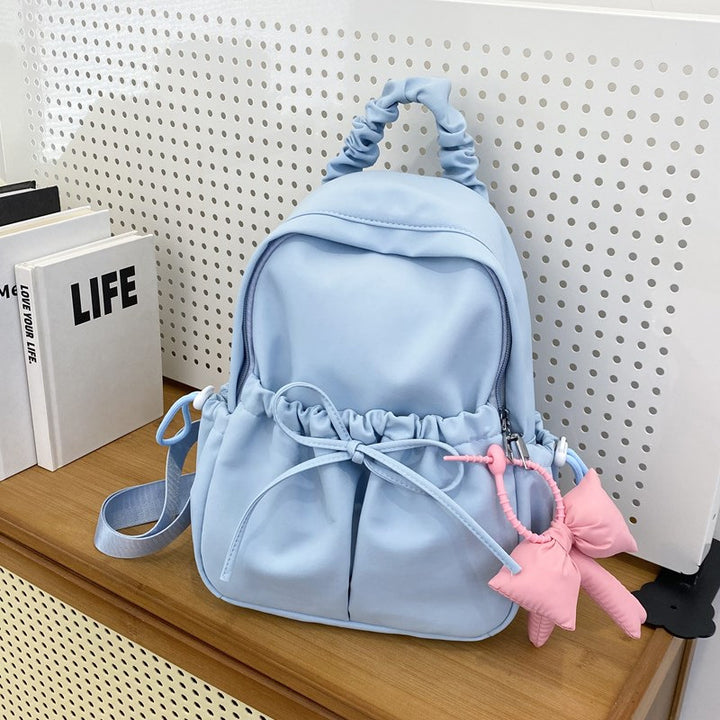 Fashionable backpack with playful details Bowlift
