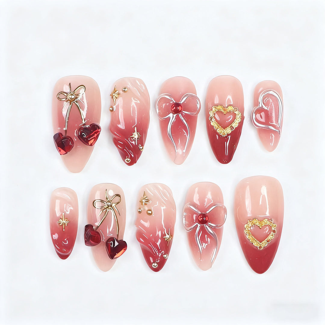 Decorative artificial nails with romantic heart and bow motifs Bowlift