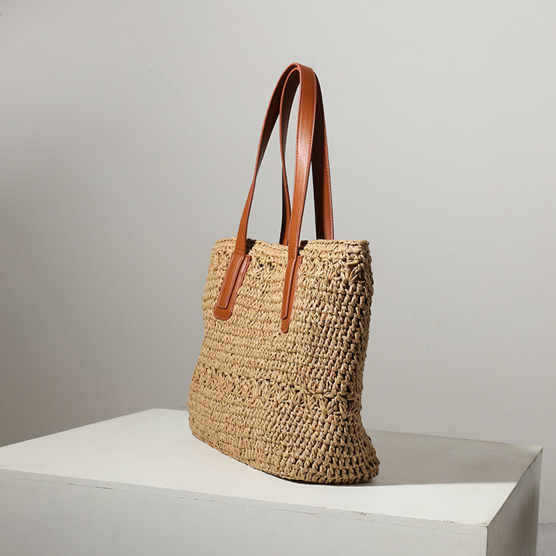 Braided straw bag with sturdy leather handles Bowlift