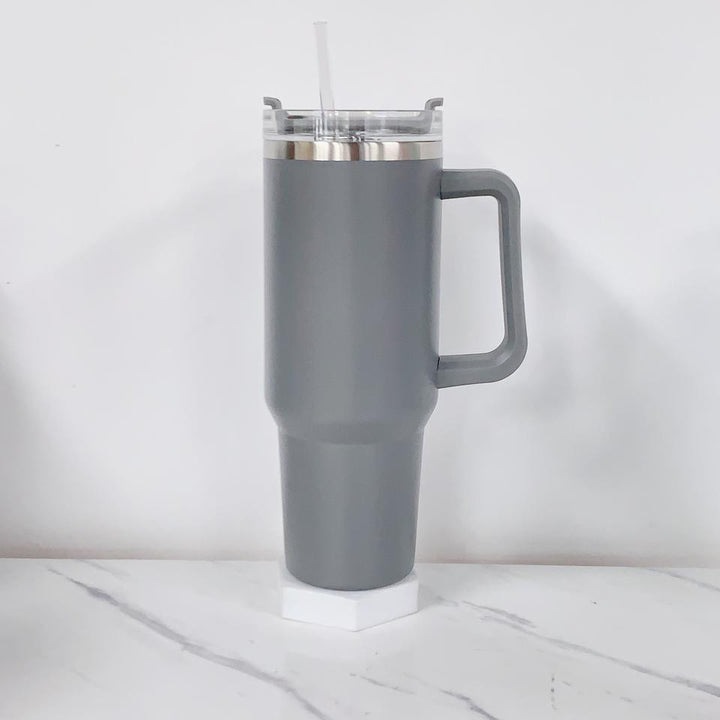 Women's insulated drinking cup with practical carrying handle Bowlift