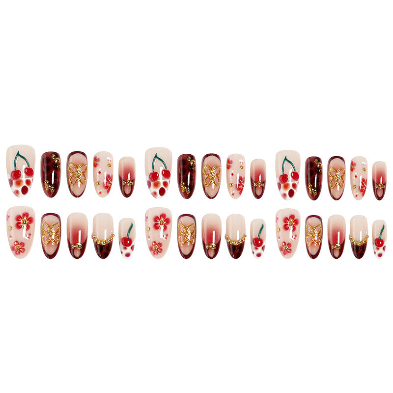 Artful nail tips with cheerful flower and cherry design Bowlift