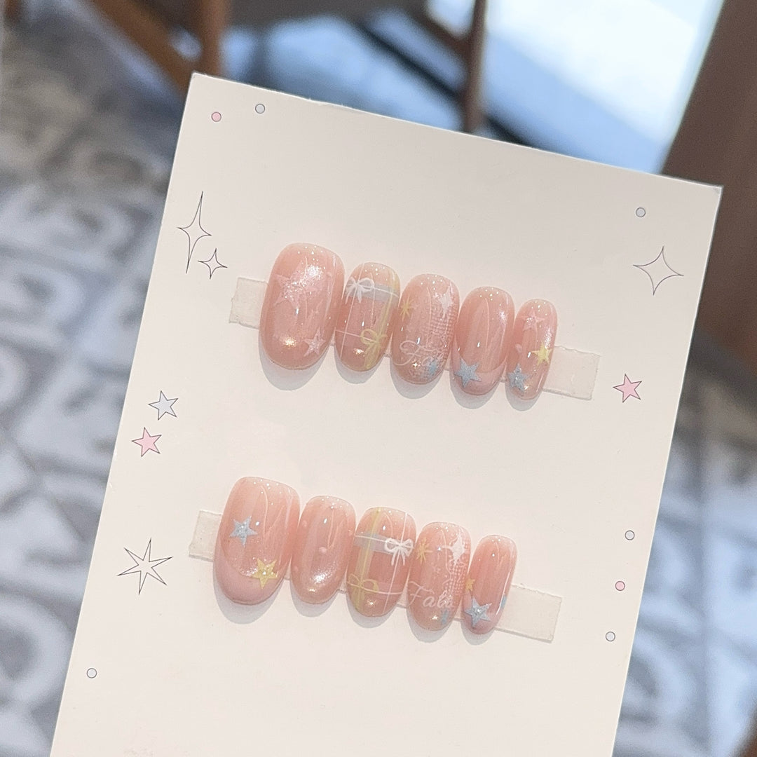 Artificial nails with romantic star and glitter motifs Bowlift