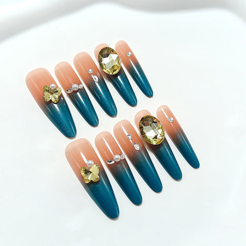 Glamorous artificial nails with elegant ombre effect and high-quality embellishments Bowlift