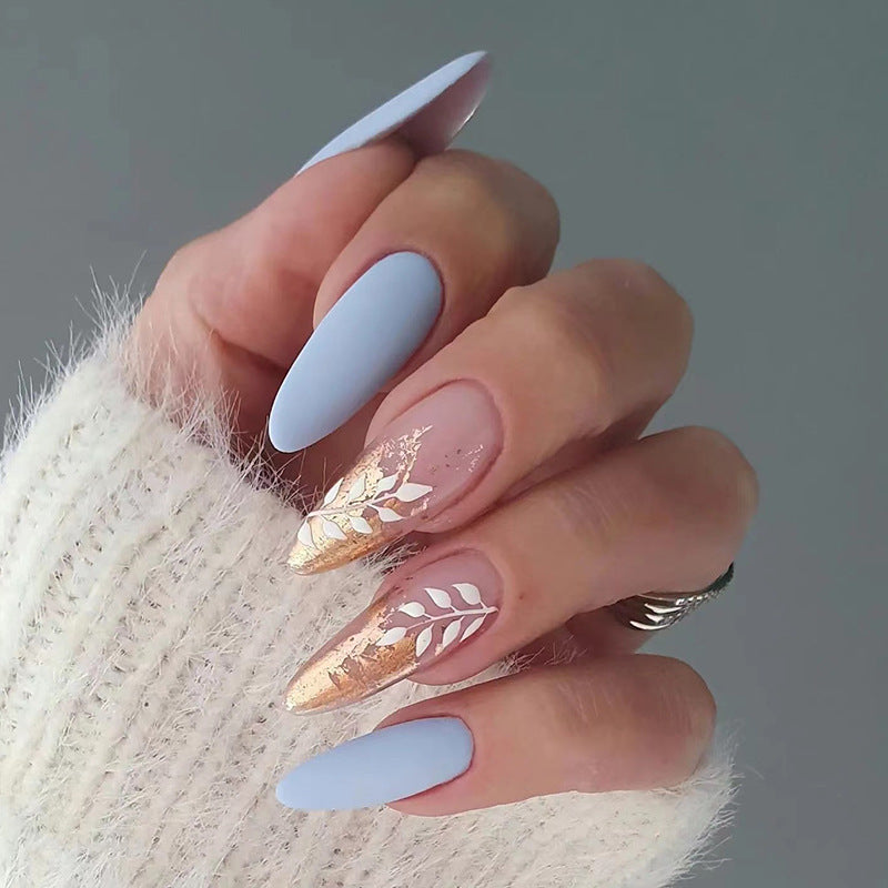 Artful nail extensions with an elegant leaf pattern Bowlift
