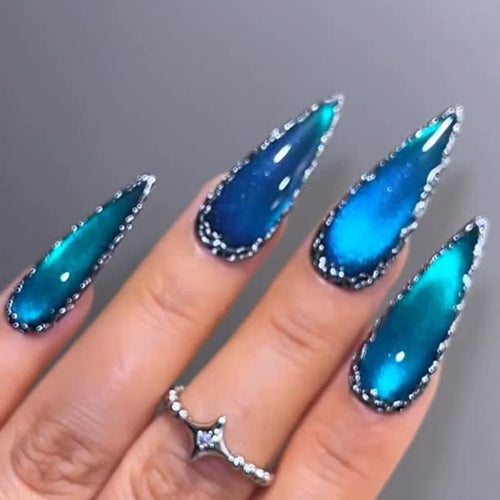 Glamorous artificial nails in elegant stiletto design with sparkling accents Bowlift
