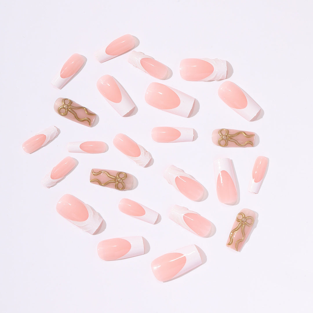 Artificial nail set with luxurious golden accents and elegant design Bowlift