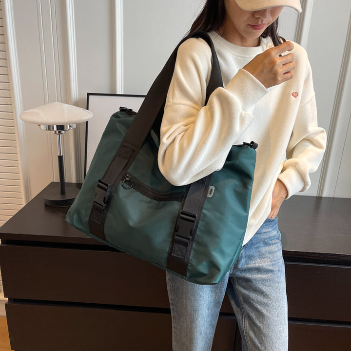 Spacious sports duffel bag with ergonomic carrying handles and water-repellent material Bowlift
