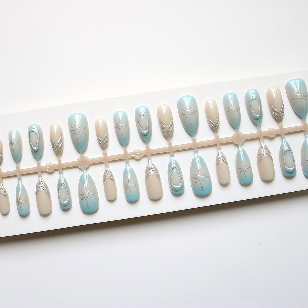 Artistic Press-On Nail Art Set with Silver Accents Bowlift