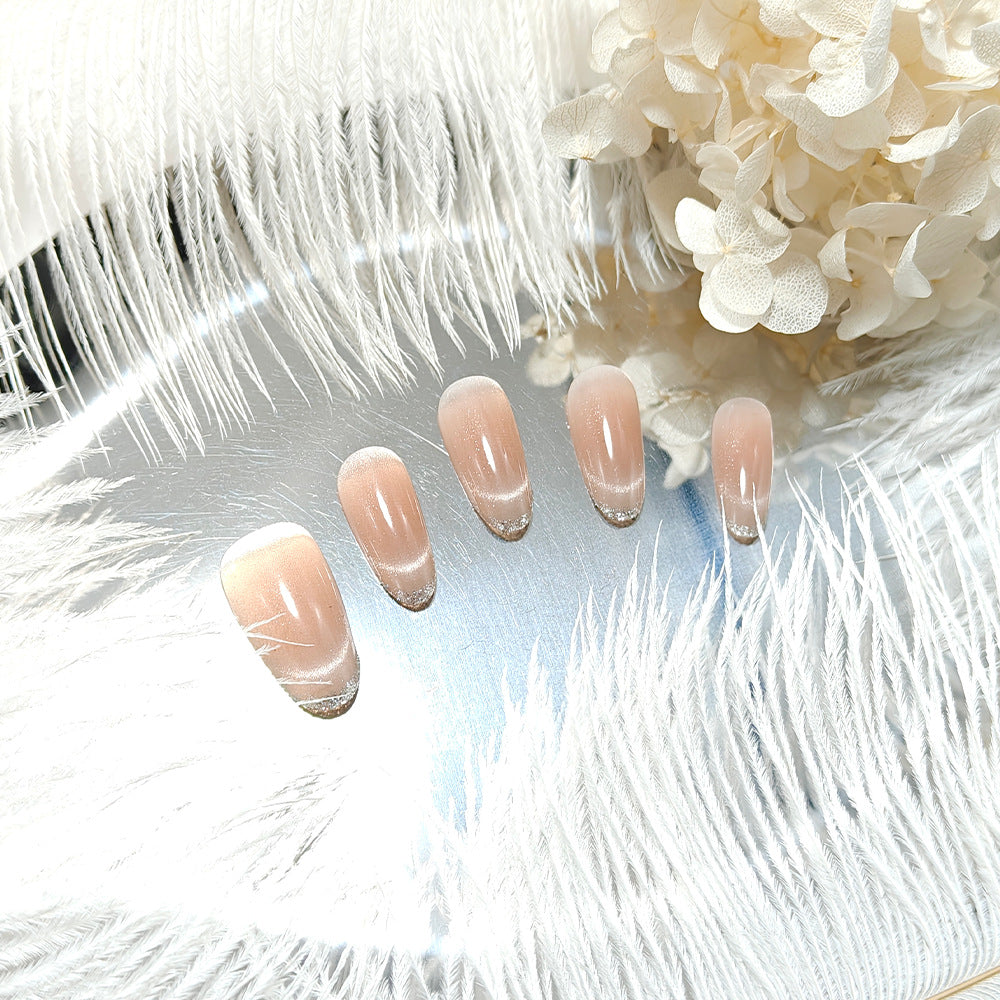 Artificial nails in elegant French manicure design Bowlift