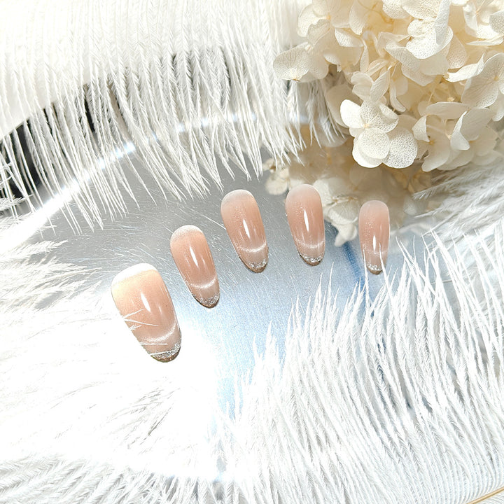 Artificial nails in elegant French manicure design Bowlift