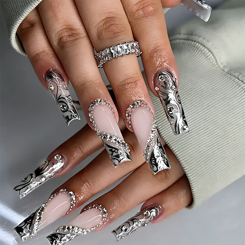 Elegant artificial nails with stylish embellishments Bowlift