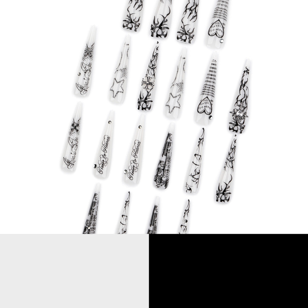 Artful stiletto nails with gothic pattern and embellishments Bowlift