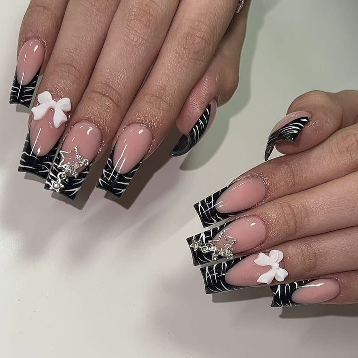 Elegant 3D Nail Art Extensions with Floral Accents Bowlift