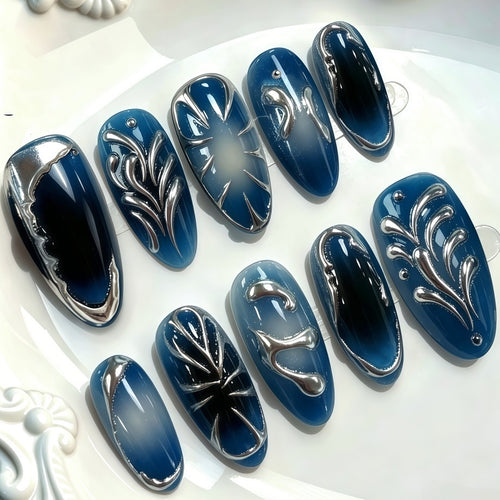 Glamorous artificial nails with unique metallic accents Bowlift