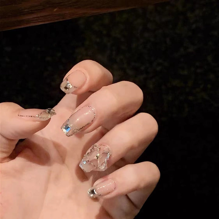 Glamorous artificial nails with delicate rhinestone decorations Bowlift