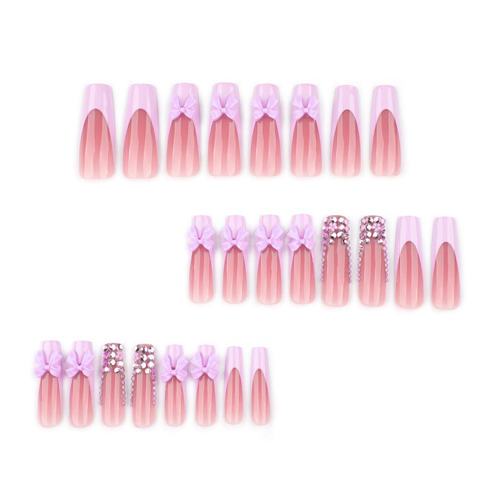 Artful Nail Art with Rhinestone Accents and Bows Bowlift