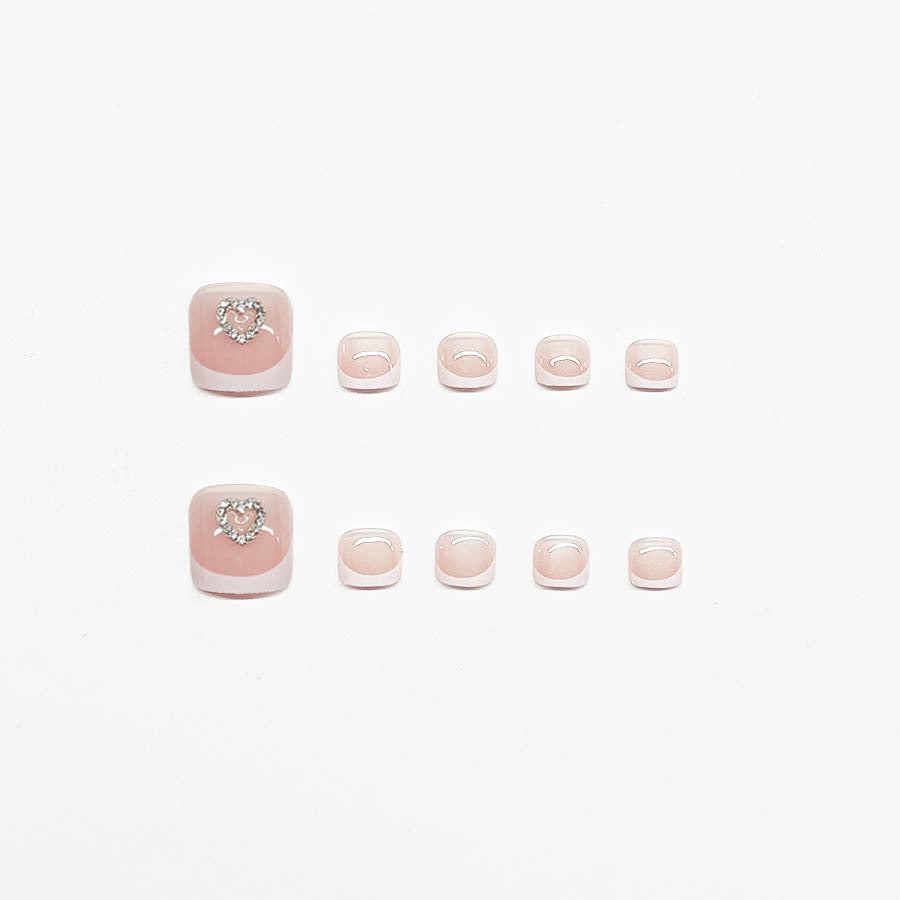 Acrylic nail set with playful heart design Bowlift