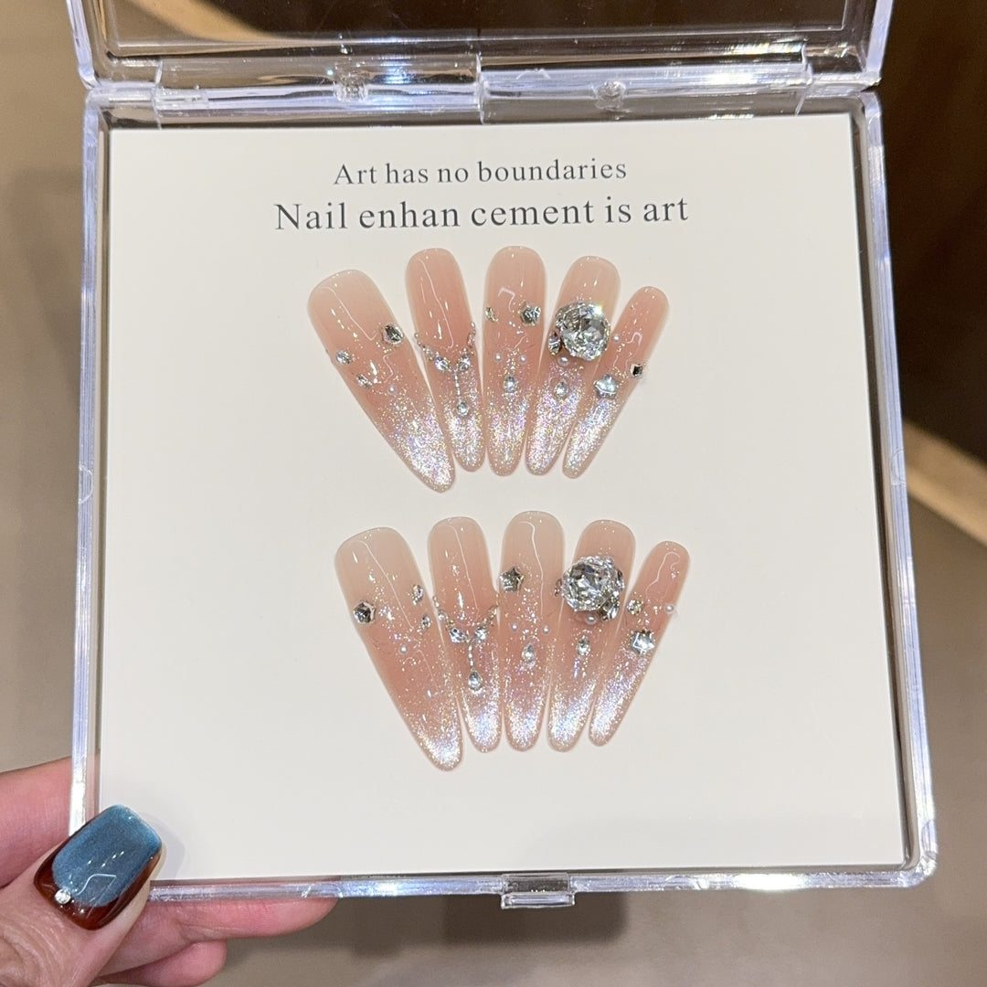 Artificial artificial nails with luxurious glitter and rhinestone design Bowlift