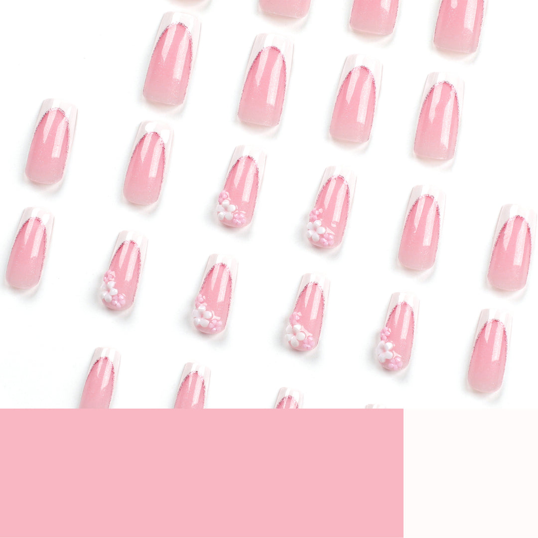 Artful Nail Extensions with Glitter and Flower Accents Bowlift
