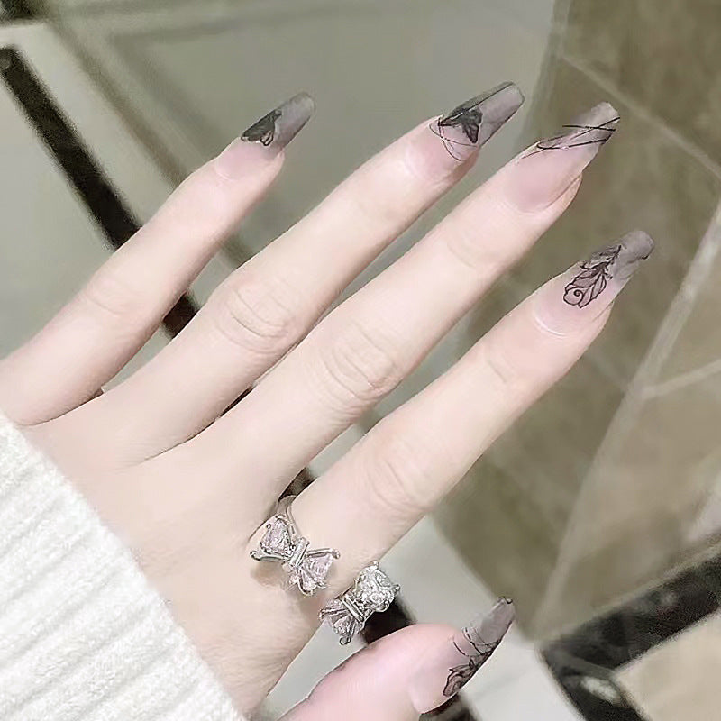 Artificial nails with floral designs Bowlift