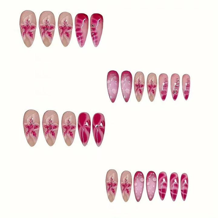 Artistic Stiletto Nail Enhancements with Intricate Floral Design Bowlift
