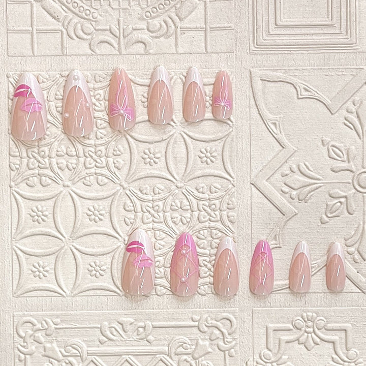 Artistic Press-On Nail Set with Kiss and Bow Design Bowlift