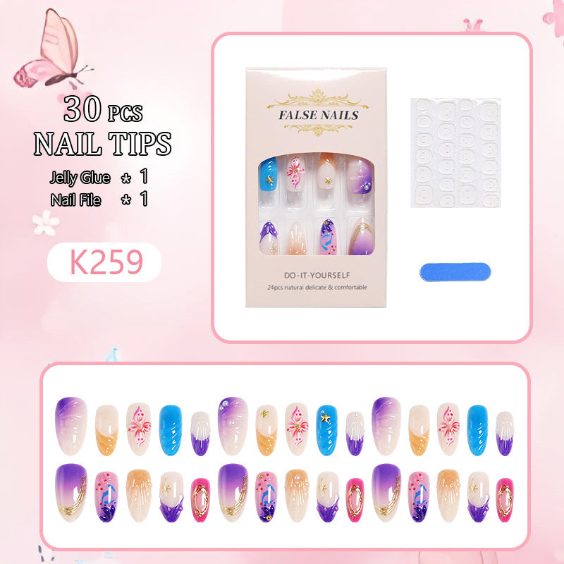 Creative nail art set with floral and glamorous embellishments Bowlift