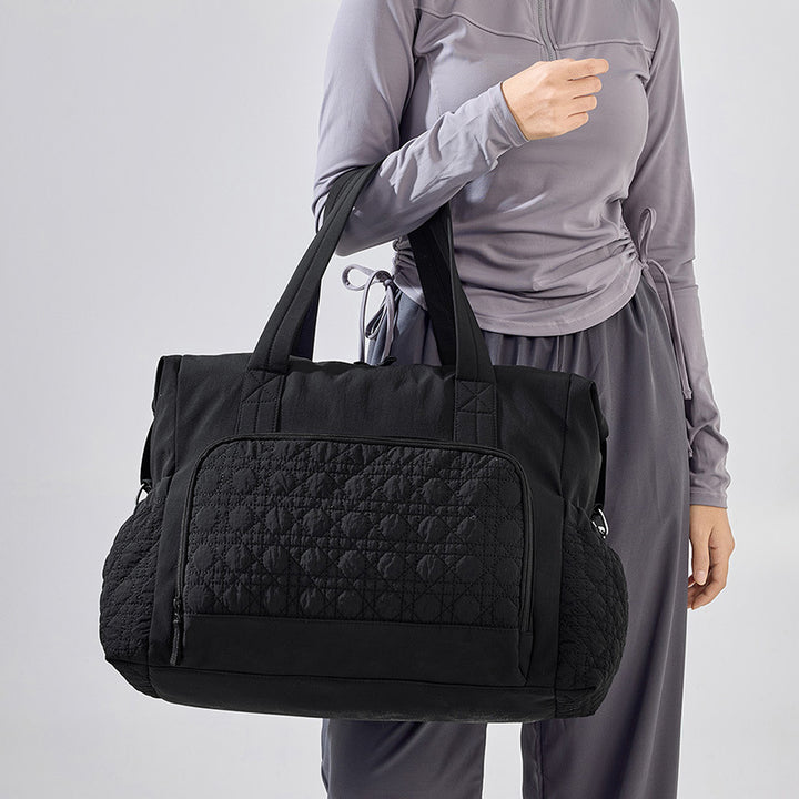 Sporty travel bag with innovative compartment design Bowlift