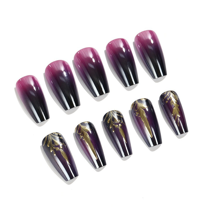 Artificial nails in elegant ombré design with gold accents Bowlift
