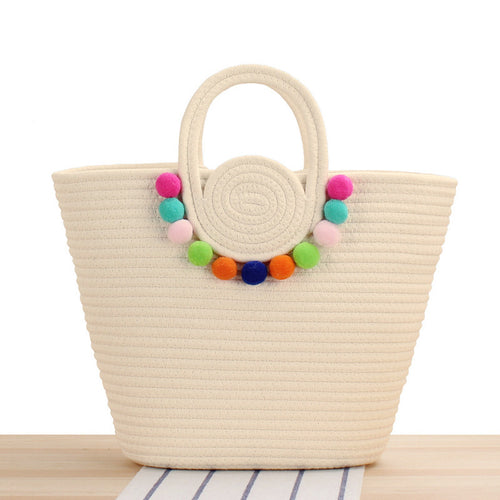 Playful beach bag with colorful pompom decor Bowlift