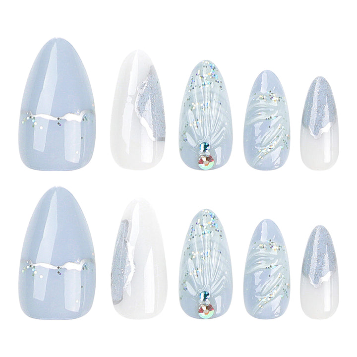 Artful stiletto nails with elegant glitter and floral design Bowlift