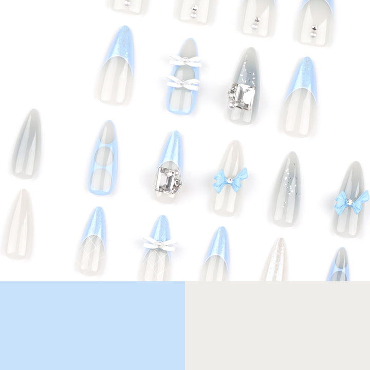 Artistic stiletto nails with elegant jewelry accents Bowlift