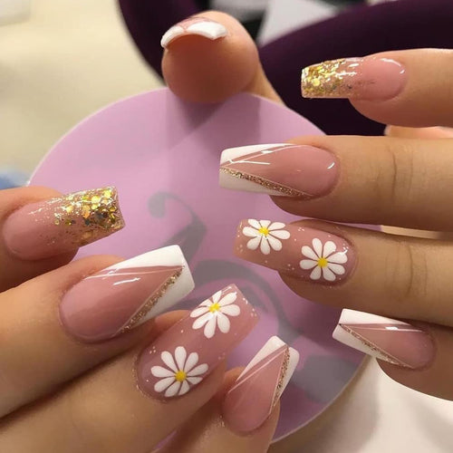 Artful nail extensions with floral designs and glitter accents Bowlift