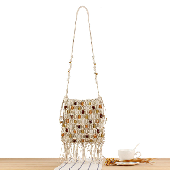 Hand-knotted shoulder bag with decorative beads and fringes Bowlift