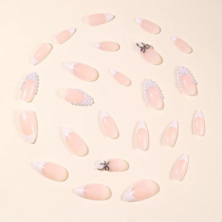 Acrylic nail set with elegant pearl and bow decorations Bowlift